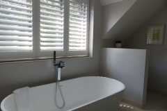 Bathroom Window with White Waterproof Shutters