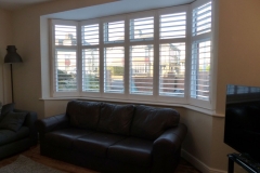 Shutters on Wide Angled Bay Window in Living Room
