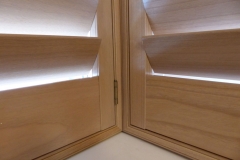 Close Up of Natural Wood Shutters in Square Bay