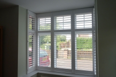 Small Bay Window with White Shutters Fitted
