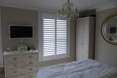Wooden Plantation Shutters in Bedroom Window