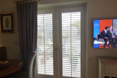 Shutters and no frame mounted on a door