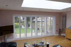 Patio Doors with White Shutters on a Track