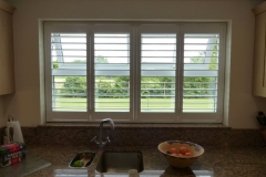 Full Height Plantation Shutters in Four Panel Window in Kitchen