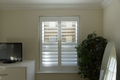 Full Height Shutters with Split Tilt Louvres in Bedroom
