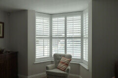 Small Angled Bay Window with White Shutters Fitted