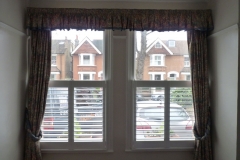 Half Height Plantation Shutters in Two Windows