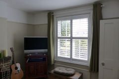Shutters Fitted To Square Window in Living Room