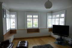 Living Room with Shutters Fitted to Corner Windows