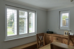 Three Panel Window and Single Window Fitted with Shutters in the Dining Room