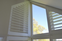 Custom Made Plantation Shutters Fitted to Shaped Window