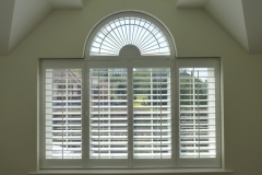 Fan Shaped Window with Louvered Shutters Fitted