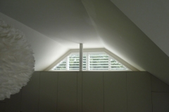 Small Shaped Window with Plantation Shutters Fitted