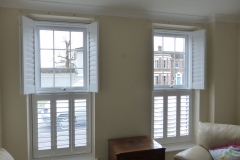 Top Opening Shutters In Living Room with Top Shutters Open