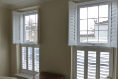 Two Sets of Top Opening Shutters with Top Shutters Open