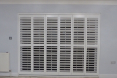 Tracked Shutters Across Patio Doors