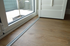 Shutters Mounted on Track on the Floor
