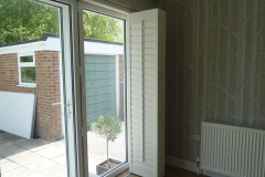 Tracked Bi-Folding Shutters Pushed to Right Hand Side of Patio Doors