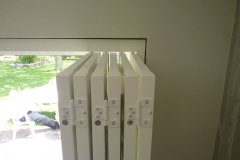 White Shutters Bi-Folded Open on a Track