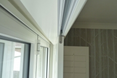 Close Up of Plantation Shutters Mounted on a Track