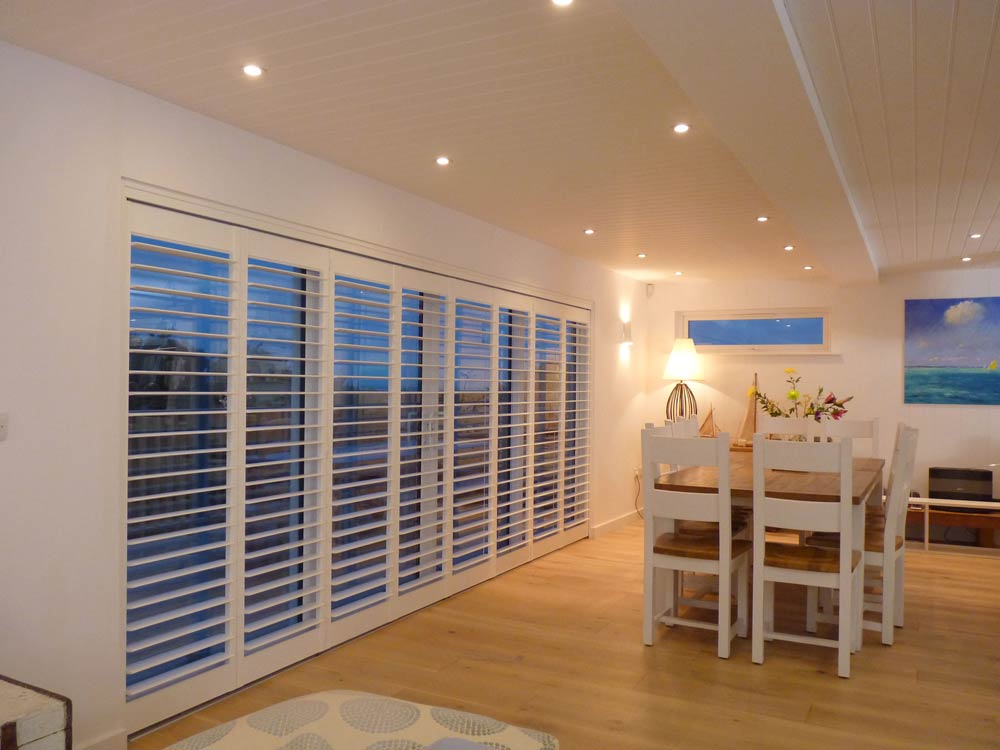 8 tracked shutters in a beach house