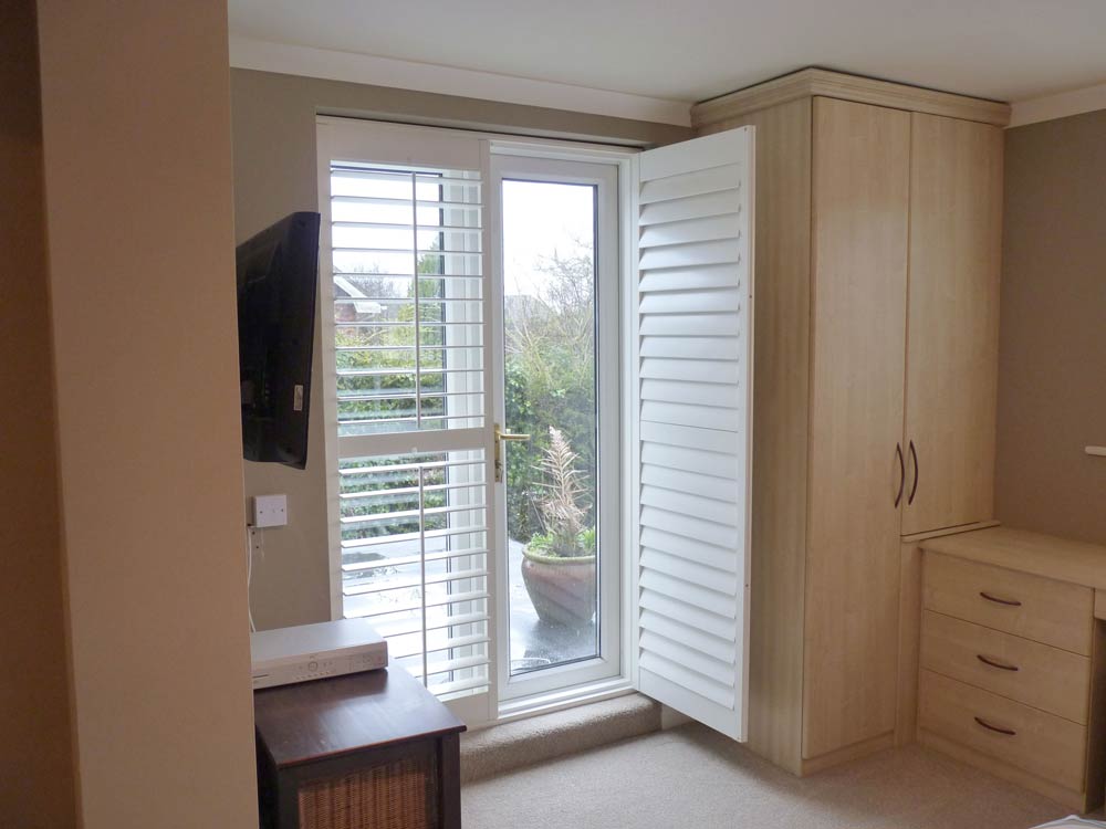 Open door shutter on bedroom patio door Open door shutter on bedroom patio door