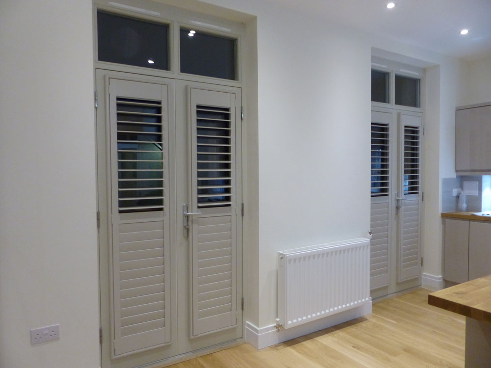 Colour Matched Grey Shutters Fitted to Kitchen Doors Colour Matched Grey Shutters Fitted to Kitchen Doors