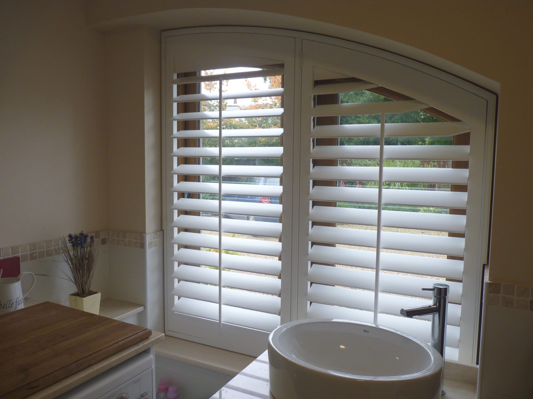 Custom Shaped Shutters Fitted to Kitchen Window